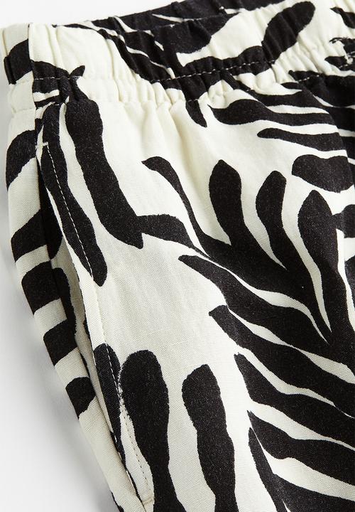 H&M - Linen-blend pull-on trousers - cream leaf-patterned