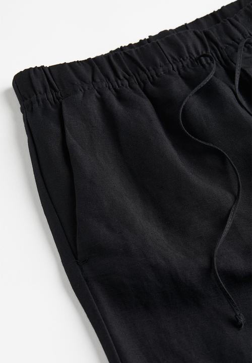 H&M - Linen-blend tapered trousers - black