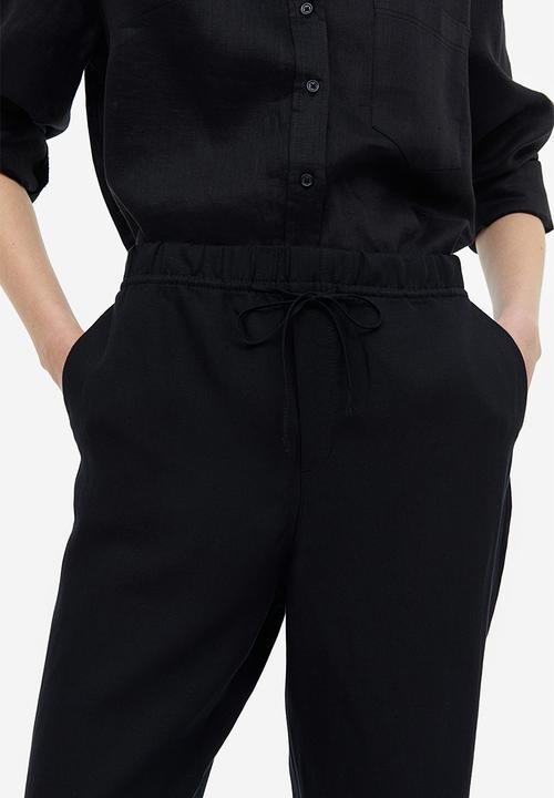 H&M - Linen-blend tapered trousers - black