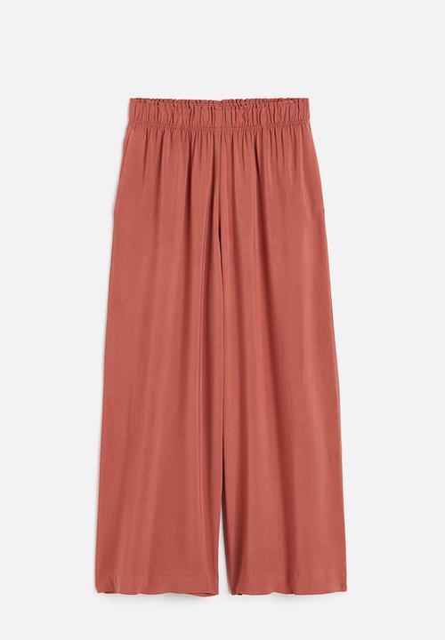 H&M - Cropped pull-on trousers - brick red 