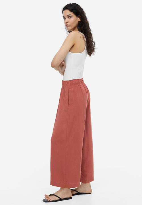 H&M - Cropped pull-on trousers - brick red 
