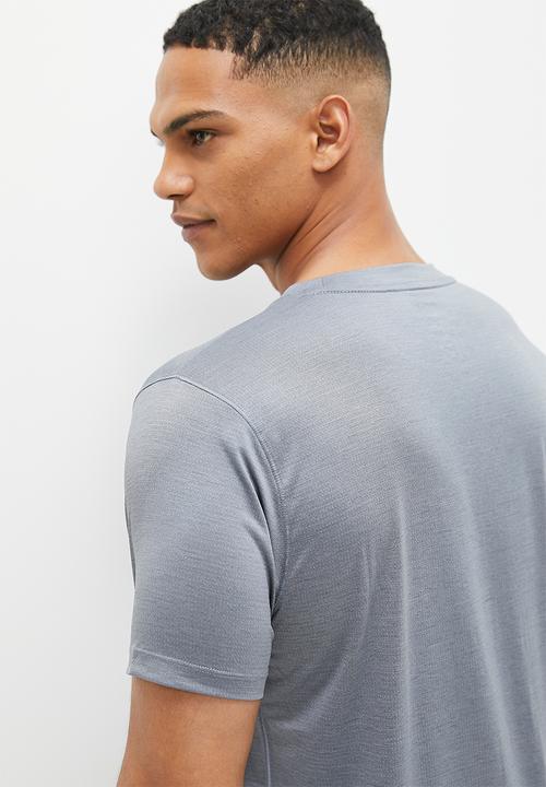 New Balance  - Tenacity short sleeve - grey