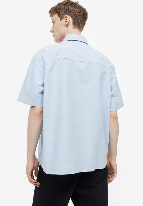 H&M - Relaxed fit short-sleeved oxford shirt - light blue 