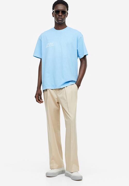 H&M - Relaxed fit printed T-shirt - light blue/summer tour