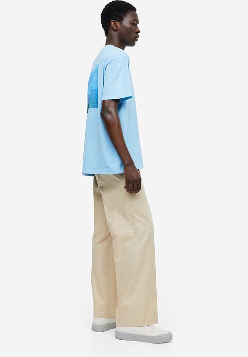 H&M - Relaxed fit printed T-shirt - light blue/summer tour