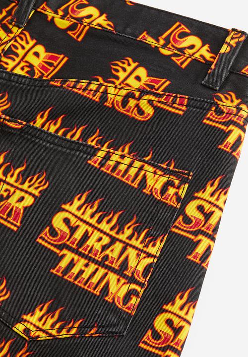 H&M - Loose fit printed twill shorts - black stranger things