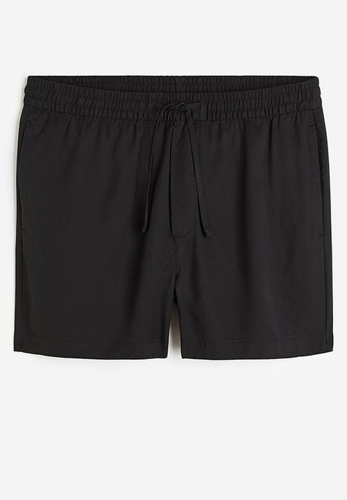 H&M - Regular fit lyocell shorts - black