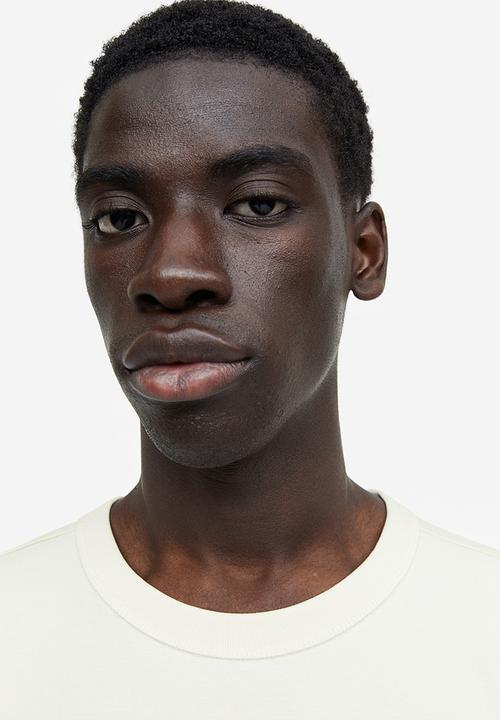 H&M - Coolmax® relaxed fit T-shirt - white trust the process