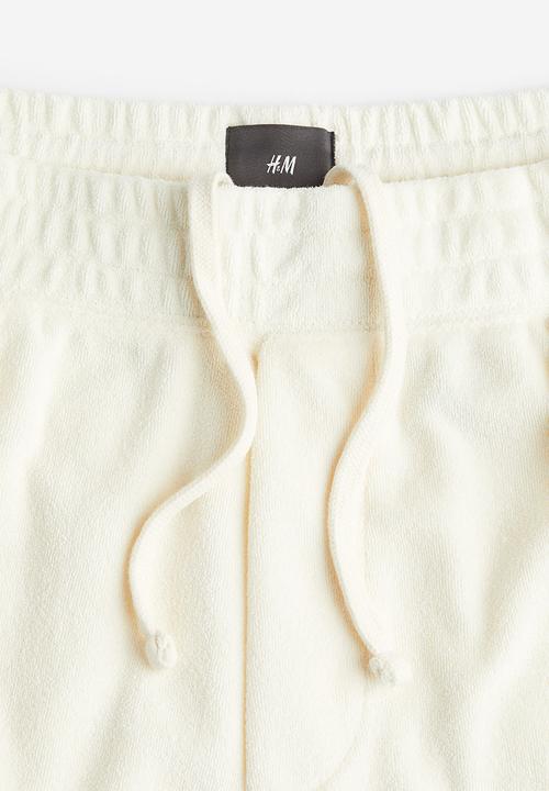 H&M - Regular fit terry shorts - cream