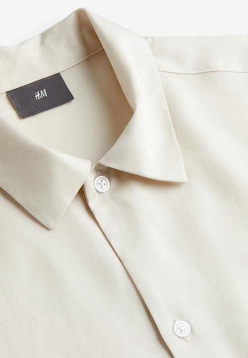 H&M - Regular fit short-sleeved lyocell shirt - beige