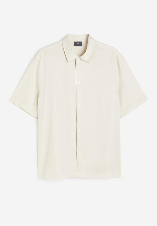 H&M - Regular fit short-sleeved lyocell shirt - beige