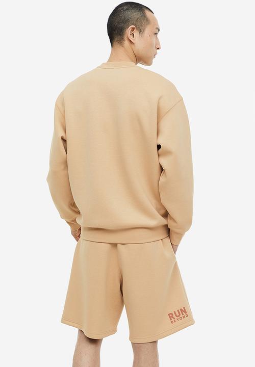 H&M - Drymove™ sports sweatshirt - beige