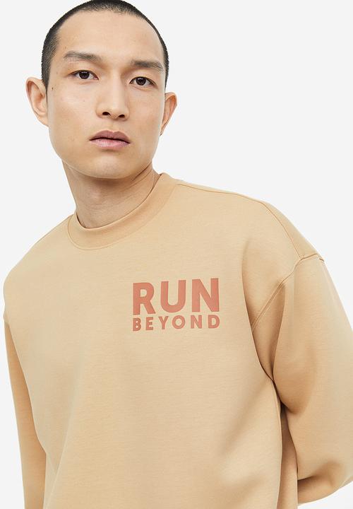 H&M - Drymove™ sports sweatshirt - beige