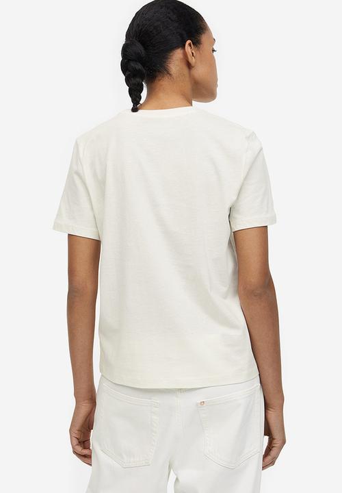 H&M - T-shirt with a motif - cream nirvana 