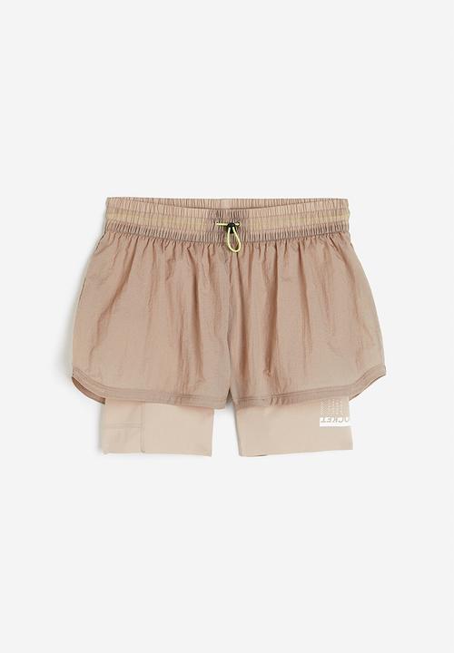 H&M - Drymove™ double-layered running shorts - beige