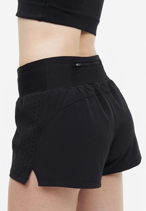 H&M - Drymove™ double-layered sports shorts - black