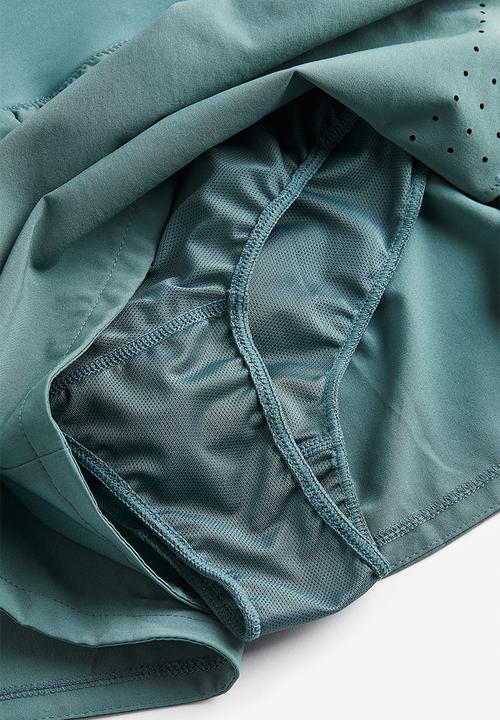 H&M - Drymove™ double-layered sports shorts - teal