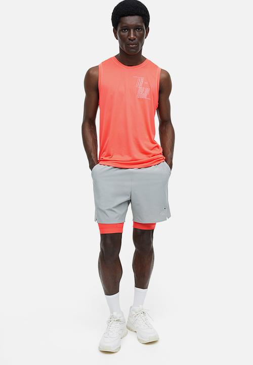 H&M - Drymove™ running vest top - coral develop