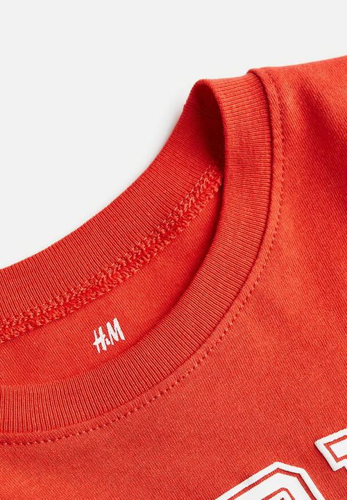 H&M - Cotton T-shirt - red world wide champ