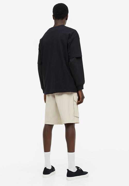 H&M - Relaxed fit nylon cargo shorts - light beige 