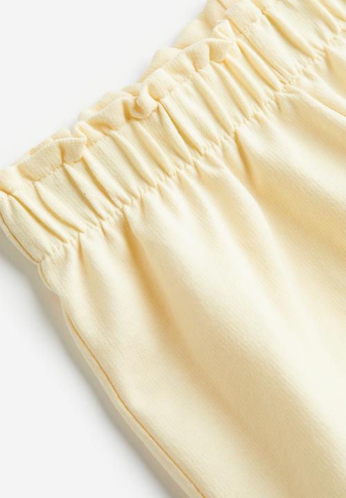 H&M - Paper bag sweatshorts - light yellow