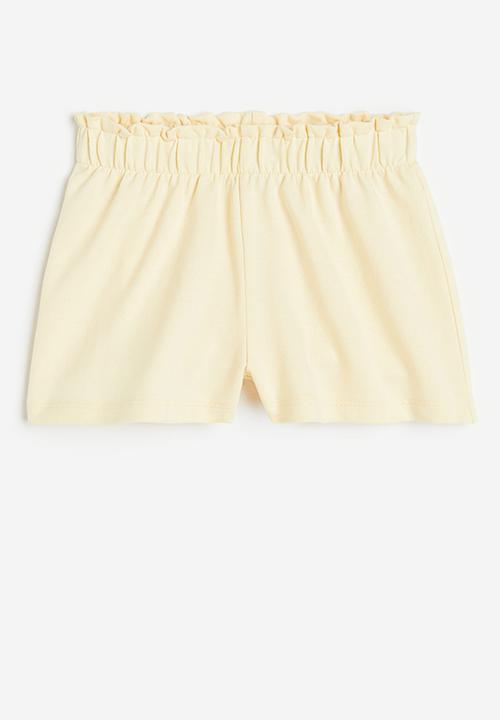 H&M - Paper bag sweatshorts - light yellow