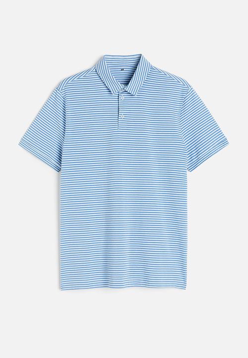 H&M - Slim fit polo shirt - blue/light blue striped