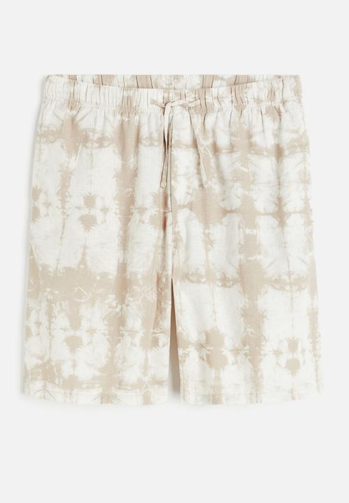 H&M - Relaxed fit linen-blend shorts - beige/white patterned