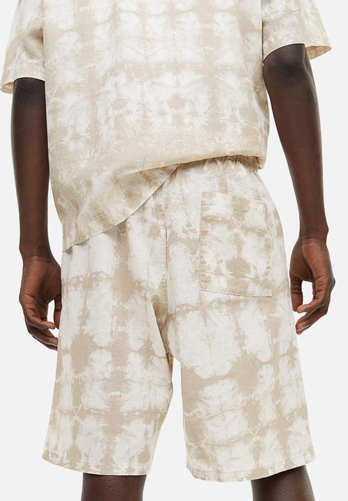 H&M - Relaxed fit linen-blend shorts - beige/white patterned