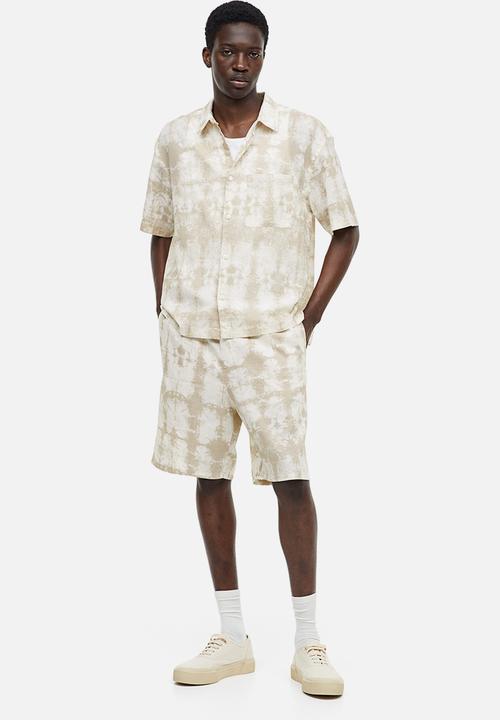H&M - Relaxed fit linen-blend shorts - beige/white patterned