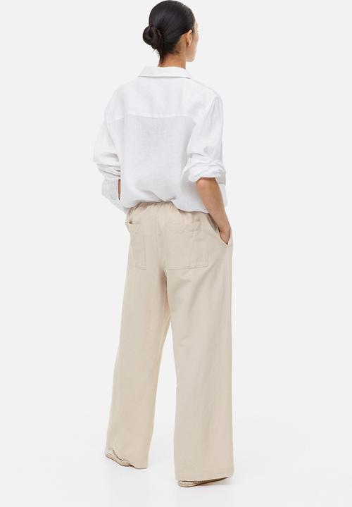 H&M - Linen-blend trousers - light beige 