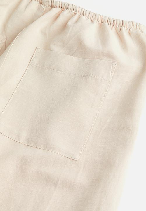 H&M - Linen-blend trousers - light beige 