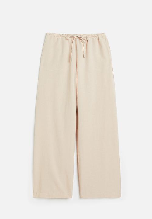 H&M - Linen-blend trousers - light beige 