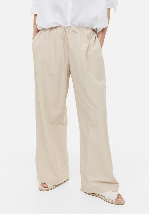 H&M - Linen-blend trousers - light beige 
