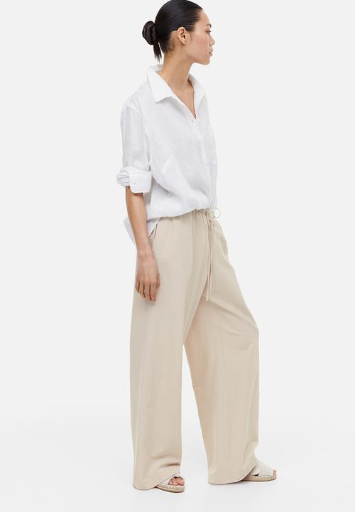 H&M - Linen-blend trousers - light beige 