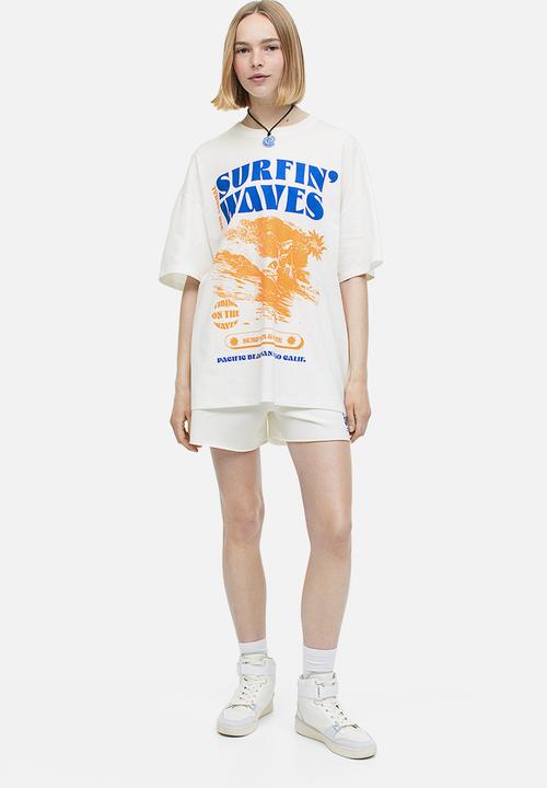 H&M - Oversized printed T-shirt - white surfin' waves 