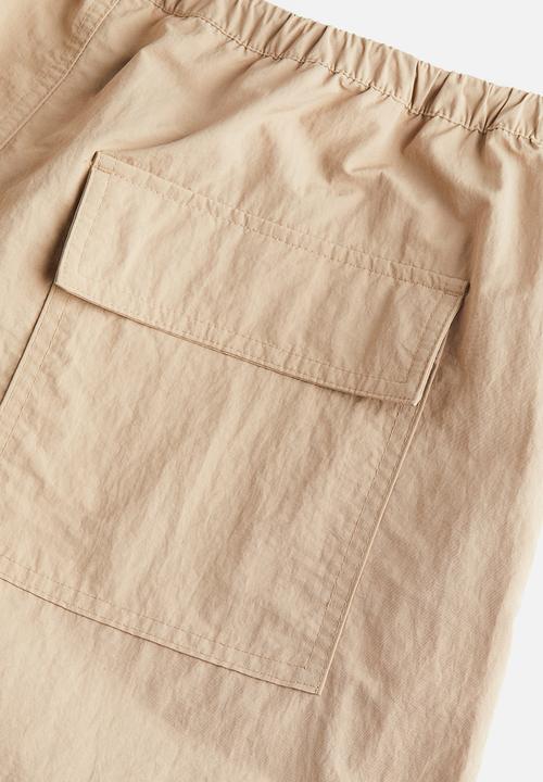H&M - Nylon parachute trousers - beige