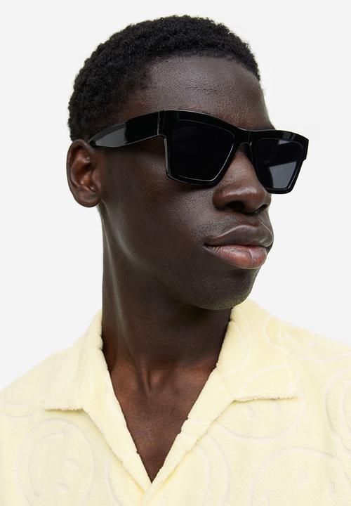 H&M - Regular fit terry polo shirt - yellow & smiley®