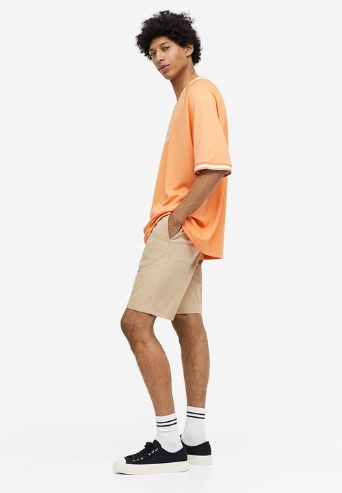 H&M - Oversized fit printed mesh t-shirt - pale orange togetherness