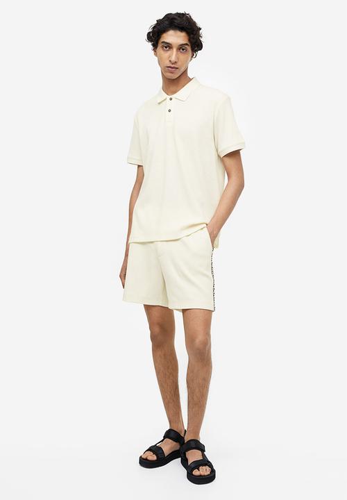 H&M - Slim fit waffled polo shirt - cream