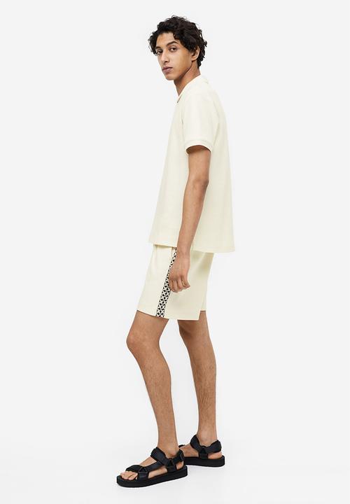 H&M - Slim fit waffled polo shirt - cream