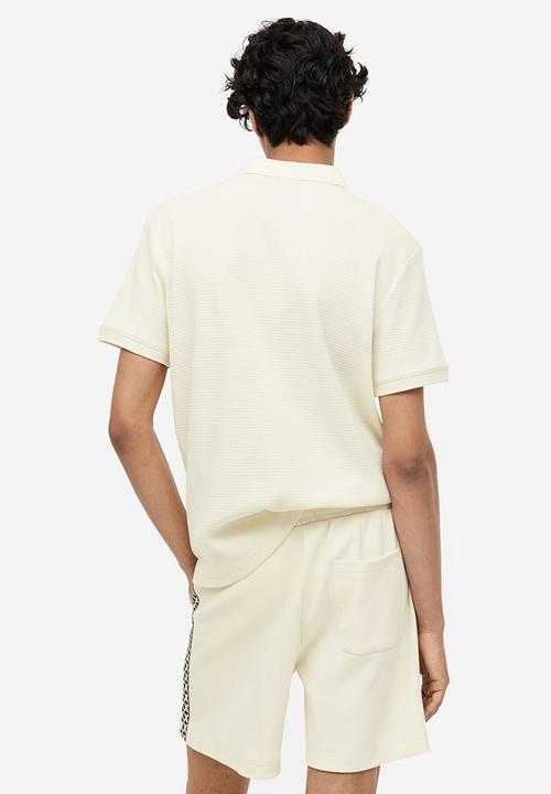 H&M - Slim fit waffled polo shirt - cream
