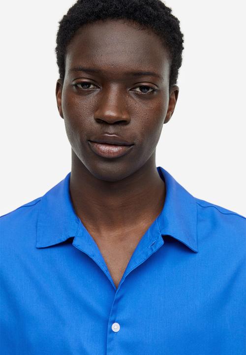 H&M - Regular fit short-sleeved lyocell shirt - bright blue