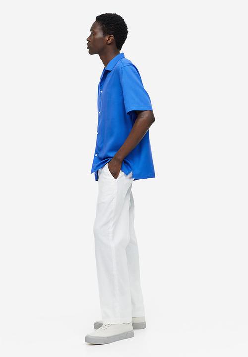H&M - Regular fit short-sleeved lyocell shirt - bright blue