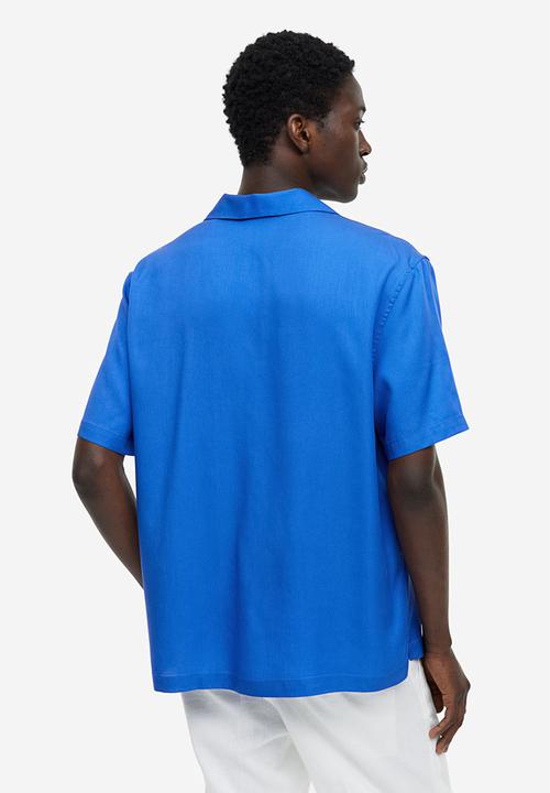 H&M - Regular fit short-sleeved lyocell shirt - bright blue