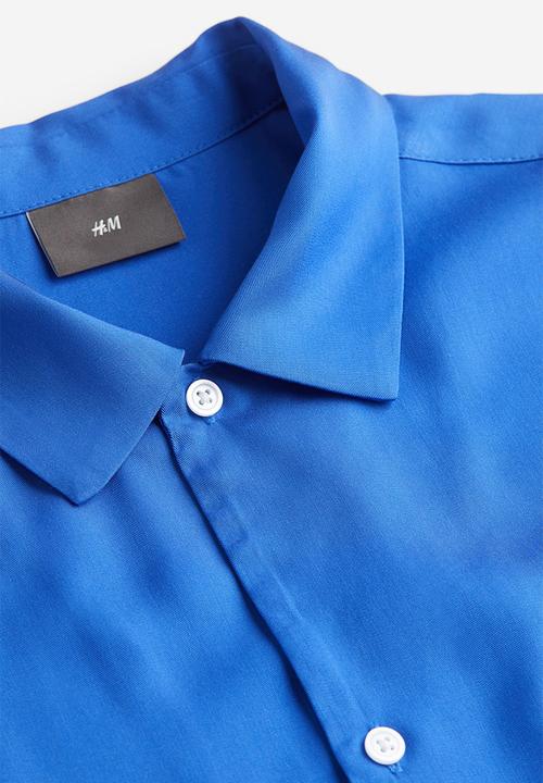 H&M - Regular fit short-sleeved lyocell shirt - bright blue