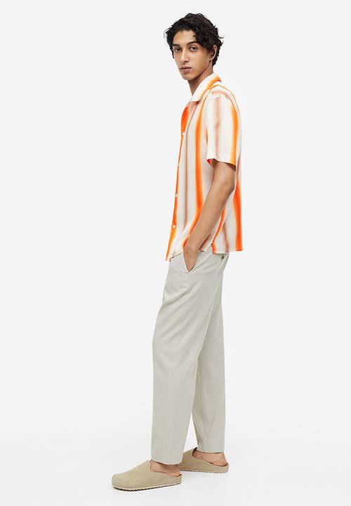 H&M - Regular fit short-sleeved lyocell shirt - orange white striped 