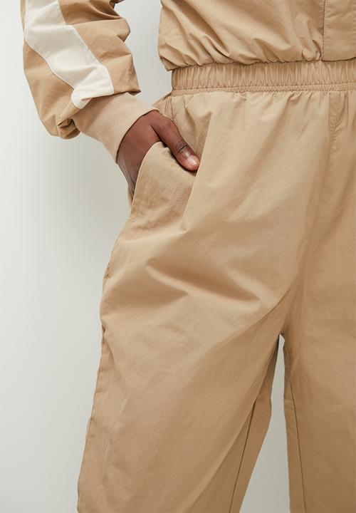 Reebok - Cl q4 jumpsuit - boulder beige f23
