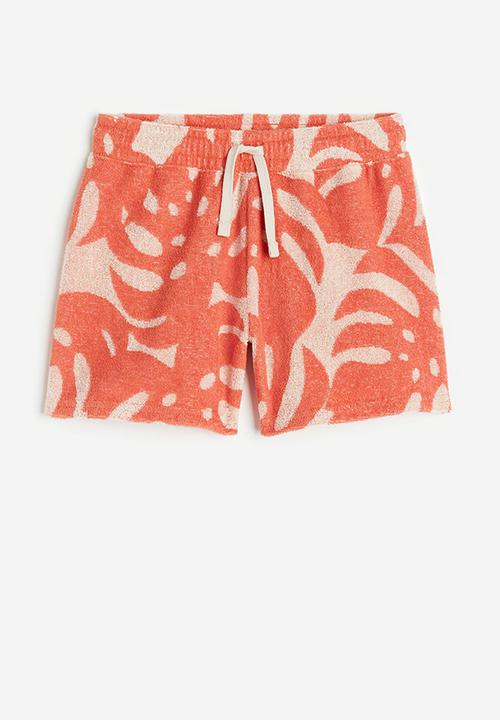 H&M - Patterned terry pull-on shorts - orange leaves