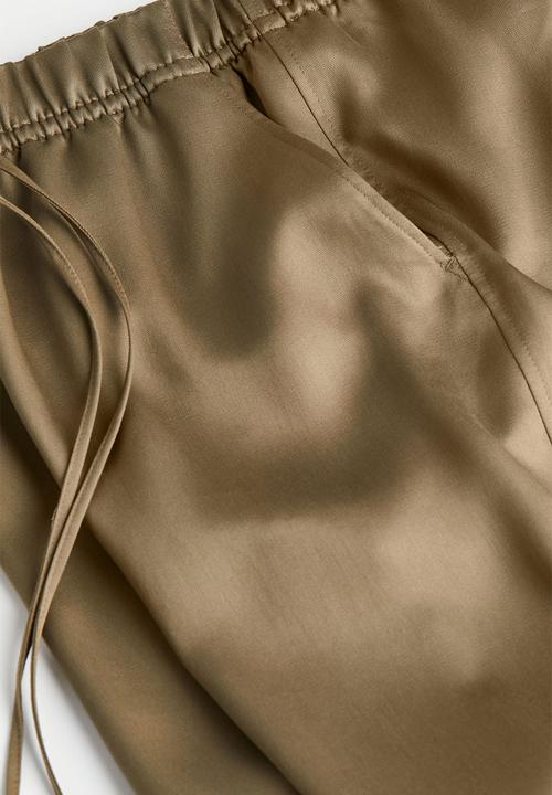 H&M - Lyocell-blend trousers - khaki green 